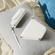 Ploom AURA Glacier White Solo and Duo Carry Case accessories on a cushion.